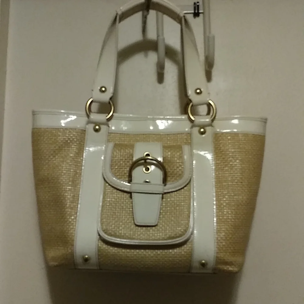 Coach white leather and straw tote.